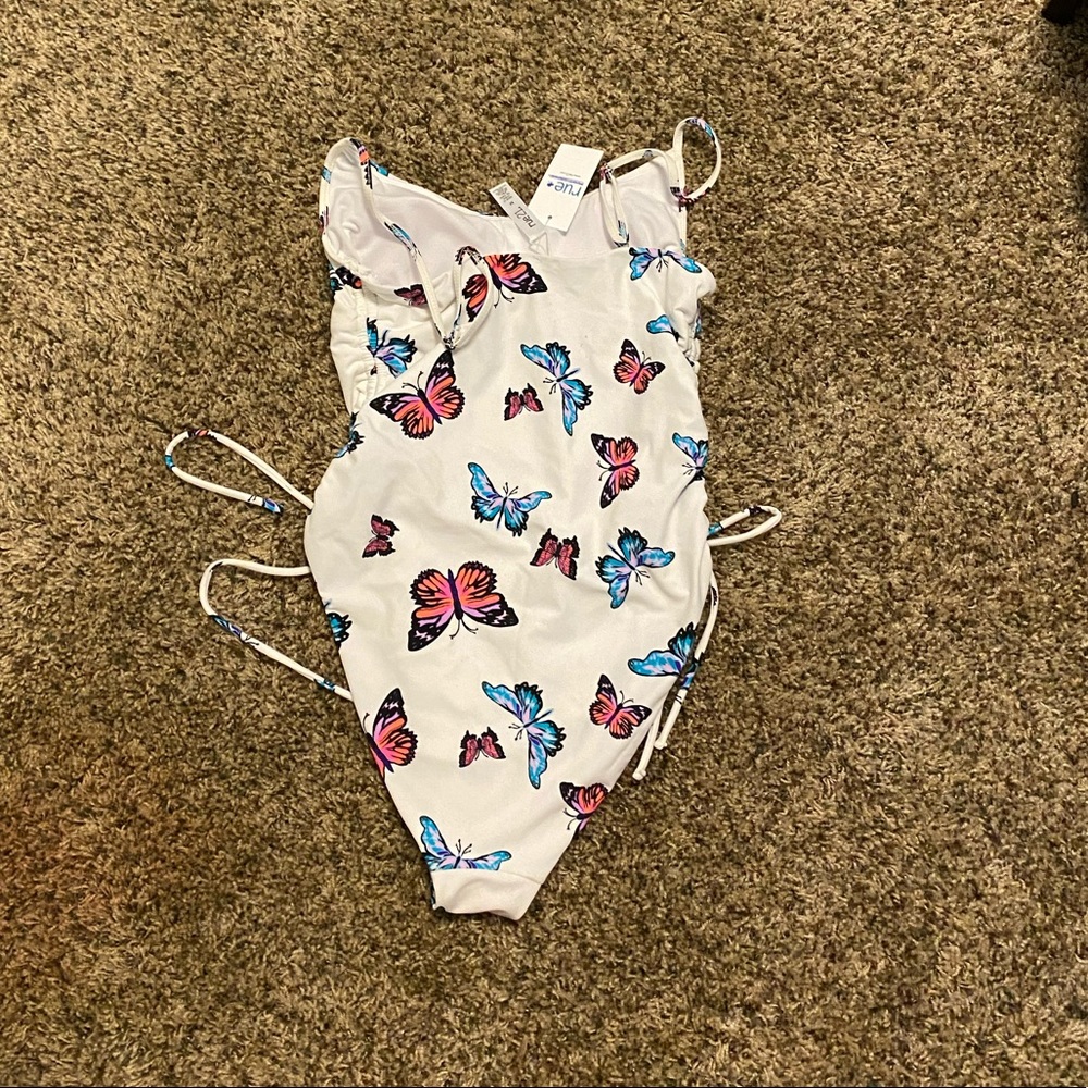 One piece bathing suit from Rue 21. Never worn